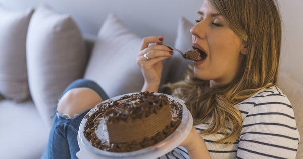 Woman eating cake